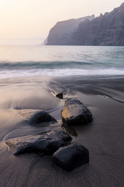 sea, black sand, stones-4320564.jpg